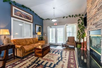 Cheyenne apartment for rent - the living room of a house with a couch and a rug