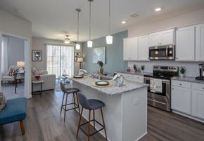 Columbia apartment for rent - a kitchen with an island and stools