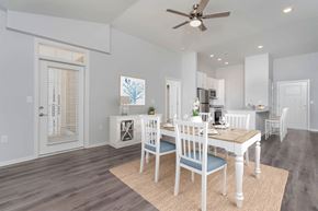 Jeffersonville apartment for rent - A dining room with a table set for four.