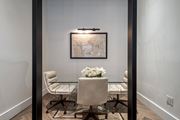 Tampa apartment for rent - A dining room with a glass table and chairs.