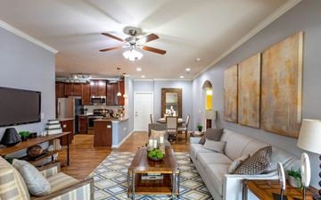 Gallatin apartment for rent - a living room with a couch and a ceiling fan
