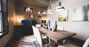 San Antonio apartment for rent - a dining room with a wooden table and white chairs