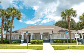 Avon Park apartment for rent - a house with palm trees in front of it