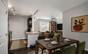 Kalamazoo apartment for rent - A dining room with a table set for a meal.