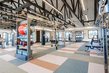 Free standing fitness center with strength & cardio equipment