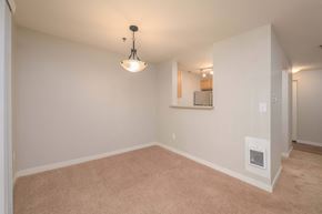 Redmond apartment for rent - A room with a carpet floor and a ceiling light.