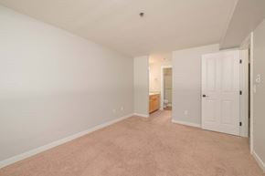 Redmond apartment for rent - A room with a carpeted floor and white walls.