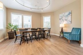 Redmond apartment for rent - A dining room with a large table and chairs.