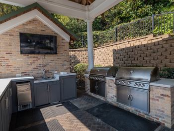 Poolside cabana kitchen with television