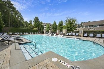 Resort style pool with tanning ledge