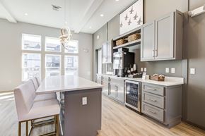 Pensacola apartment for rent - A kitchen with a white counter top and a white chair.