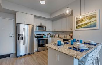 Granite countertops w/ tile backsplash
