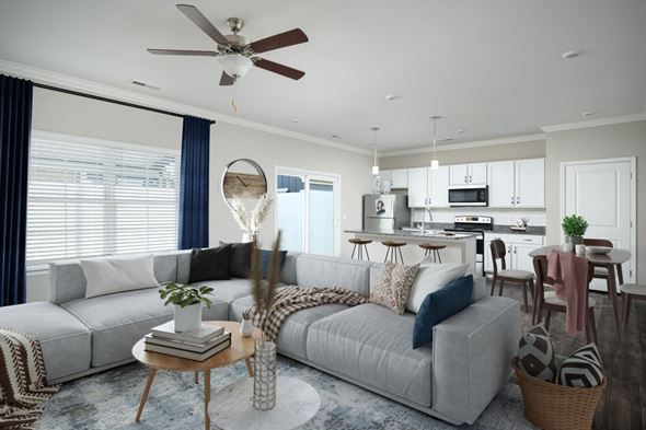 Chattanooga apartment for rent - a living room and kitchen with a couch and a ceiling fan