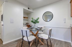 Benton apartment for rent - a dining room with a glass table and chairs