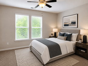 Winder apartment for rent - A bedroom with bed and painting with double window natural lighting