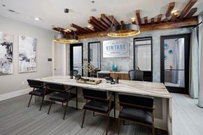 Smyrna apartment for rent - A conference room with a long table and chairs.