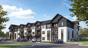 Charlotte apartment for rent - a rendering of a three story apartment building with cars on a street
