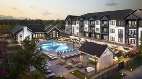 Charlotte apartment for rent - an aerial rendering of an apartment complex with a pool and patio