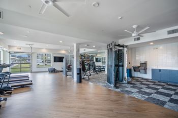 State-of-the-art fitness center w/ outdoor turf area