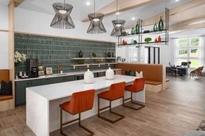 Acworth apartment for rent - a large kitchen with a white counter top and chairs