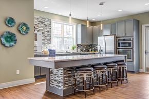 Easley apartment for rent - a kitchen with a large island with bar stools