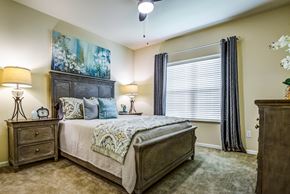 Easley apartment for rent - a bedroom with a large bed and a window