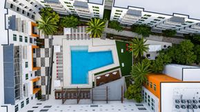 Maitland apartment for rent - A modern apartment complex with a pool and palm trees.