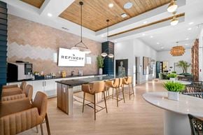 Sugar Hill townhouse for rent - A modern kitchen with a dining table and chairs.