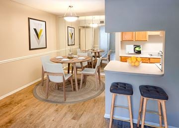 Lafayette apartment for rent - A kitchen with a dining table and chairs.