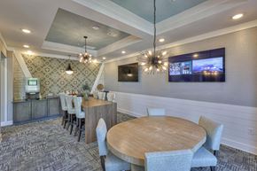 Antioch apartment for rent - A modern dining room with a wooden table and grey chairs.