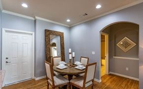 Gallatin apartment for rent - a dining room with a table and chairs and a mirror