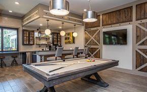Powell apartment for rent - a games room with a pool table and a tv