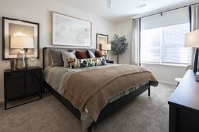 Huntsville apartment for rent - the preserve at ballantyne commons apartments bedroom with large bed