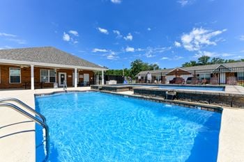 Swimming pool w/ sundeck area