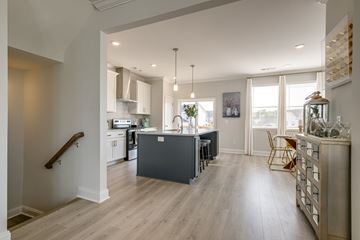 Cane Ridge apartment for rent - A kitchen with a dining table and chairs.