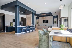 Decatur apartment for rent - A modern dining area with a table set for two.