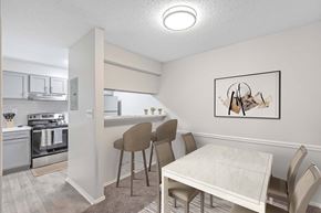 Norcross apartment for rent - A dining area with a table and chairs.