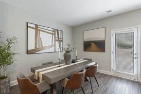 Winder apartment for rent - a dining room with a long table and chairs