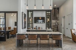 Winder apartment for rent - a kitchen with a counter top and chairs