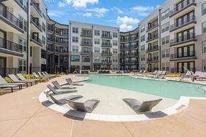 Sugar Hill apartment for rent - an empty swimming pool in front of an apartment building