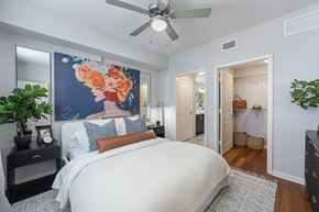 Fort Lauderdale apartment for rent - a bedroom with a large bed and a ceiling fan