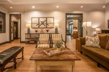 Atlanta apartment for rent - A living room with a wooden coffee table and a couch.