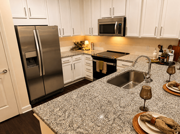 Granite countertops & accent tile backsplash