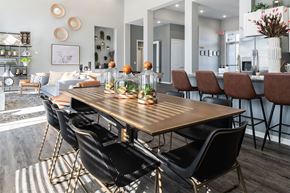 Alexandria apartment for rent - A modern dining room with a wooden table and black chairs.