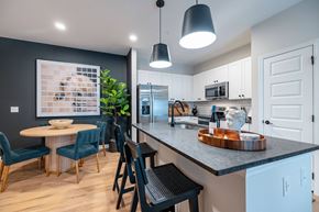 Greenville apartment for rent - A kitchen with a table and chairs.