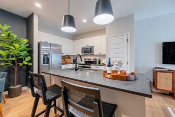 Granite countertops w/ tile backsplash