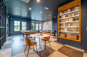 Greenville apartment for rent - A dining room with a round table and chairs.
