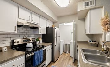 Gourmet kitchen with subway tile backsplash
