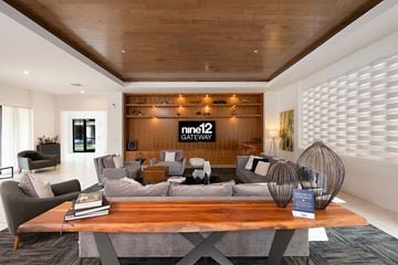 Altamonte Springs apartment for rent - A modern living room with a wooden ceiling and a coffee table in the center.