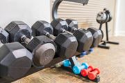 Memphis apartment for rent - a row of dumbbells on a rack in a gym